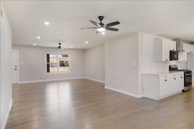 Open floor plan with kitchen beyond